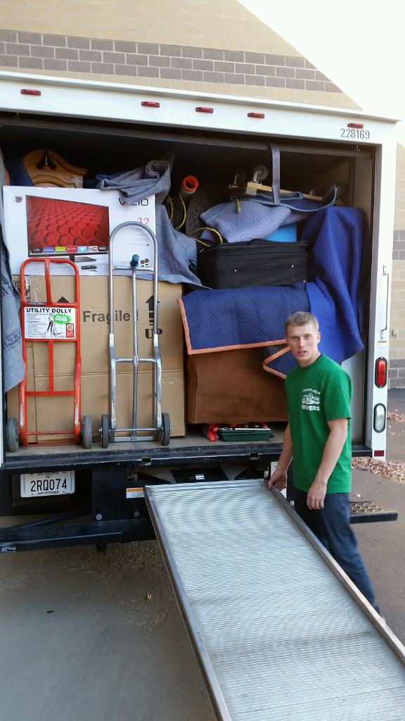 Anytime Movers crew member loading a truck